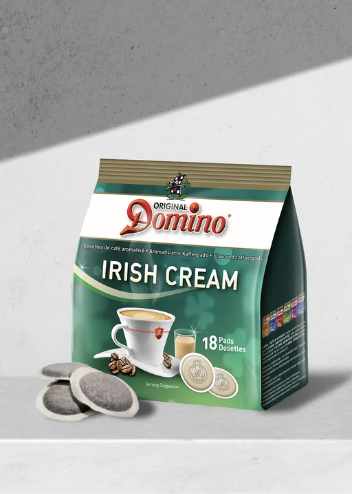 Découvrez la délicieuse expérience des dosettes de café aromatisées Original Domino Irish Cream ! Chaque paquet comprend 18 dosettes de café conçues par des experts, et nous en avons présenté trois pour un aperçu rapide. Imaginez-vous en train de savourer une tasse crémeuse de ce mélange irrésistible, parfaitement capturé aux côtés des grains de café aromatiques sur l'emballage. Parfait pour tout vrai amateur de café ! | Flaronis.lu