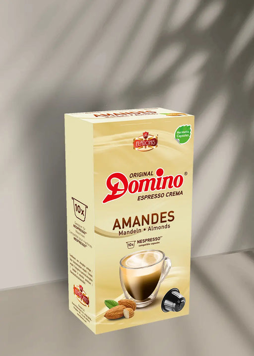 Découvrez le plaisir d'un expresso haut de gamme avec les dosettes saveur amande « Amandes » de Capsules Café Domino, compatibles avec les machines Nespresso. Chaque boîte comprend 10 capsules riches et savoureuses. L'emballage chaleureux met en valeur une tasse de café et des amandes, créant l'ambiance parfaite pour votre pause-café. Offrez-vous une expérience délicieuse à chaque gorgée grâce à ces dosettes espresso crema fabriquées avec soin par Domino. | Flaronis.lu