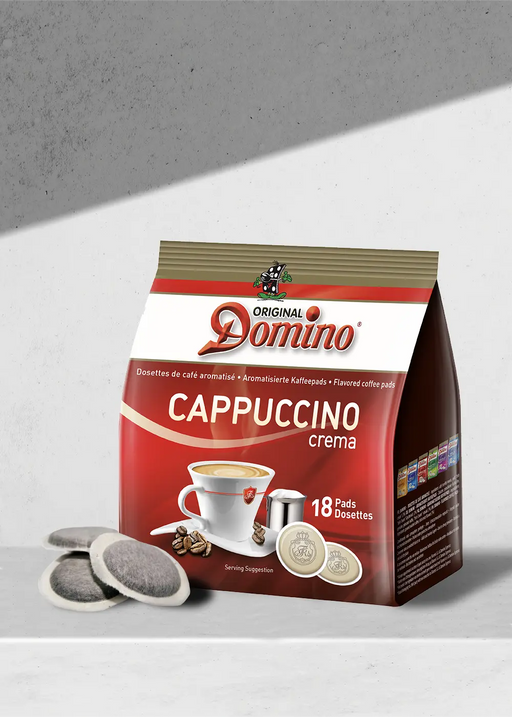 Savourez le goût riche et crémeux du cappuccino avec les dosettes de café Domino Original Cappuccino Crema. Chaque paquet comprend 18 dosettes de café pratiques, parfaites pour des moments de café rapides et délicieux. Présentant une image invitante d'une tasse de cappuccino fumant sur l'emballage, ces dosettes sont conçues pour ravir tous les amateurs de café. Insérez-en simplement un dans votre machine et savourez un cappuccino de qualité café à la maison ! | Flaronis.lu