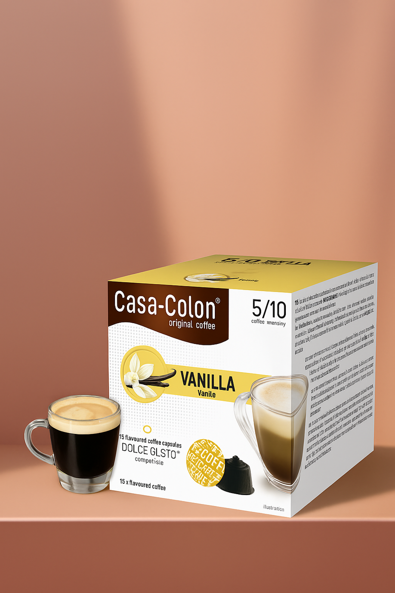 Une boîte de 16 capsules Café Casa Colon Vanille compatibles Dolce Gusto est posée à côté d'une tasse à expresso transparente. L'emballage élégant met en valeur les images alléchantes d'un café aromatique infusé à la vanille et met en valeur tous les détails du produit : idéal pour les amateurs de café en quête d'une saveur digne d'un café traditionnel, même à la maison. | Flaronis.lu